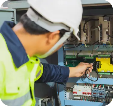 Engineer testing electrical panel